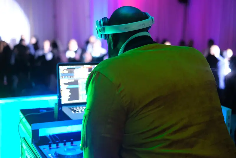 DJ at party, neon light