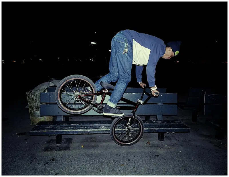 BMX trick at night