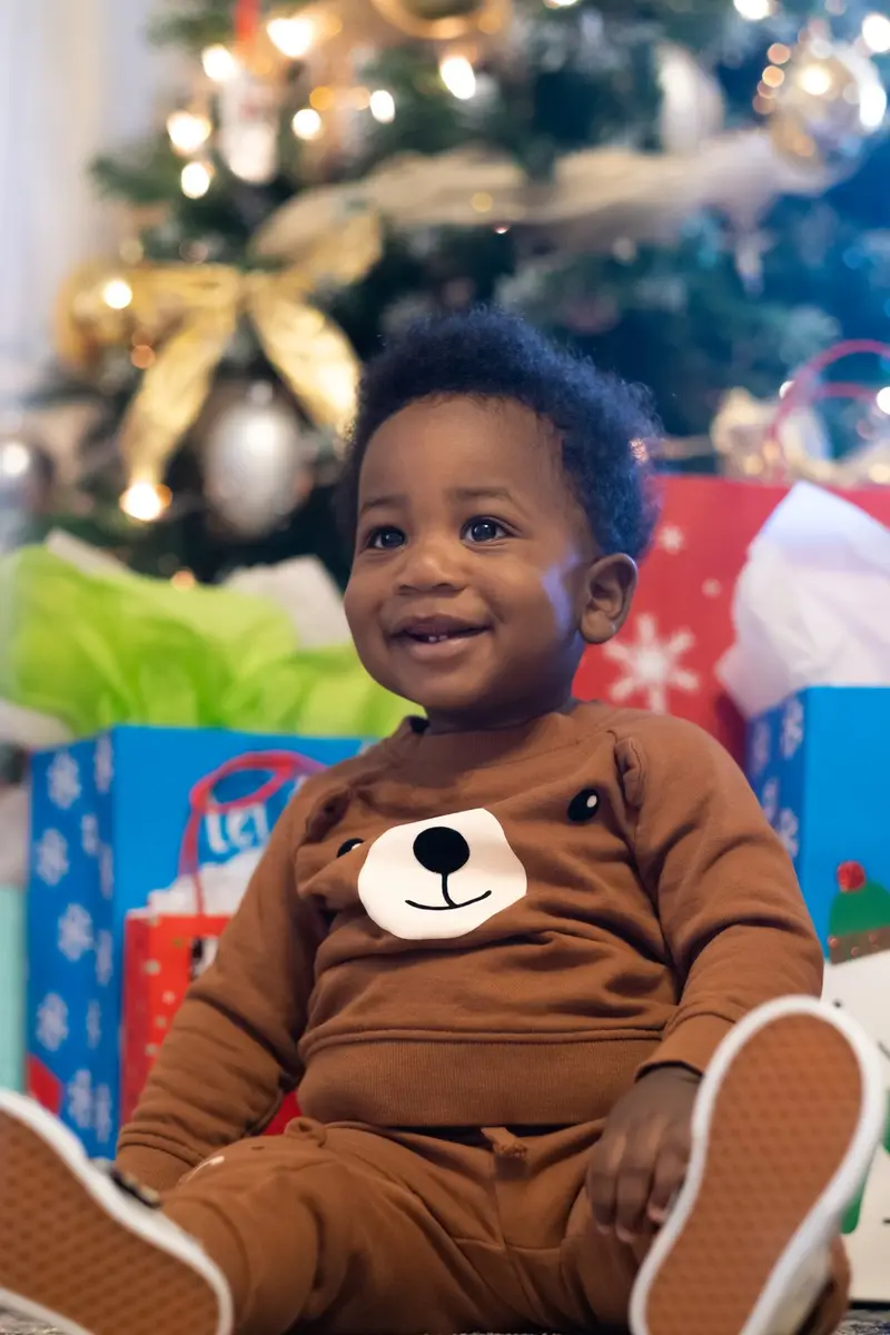 Baby at christmas tree