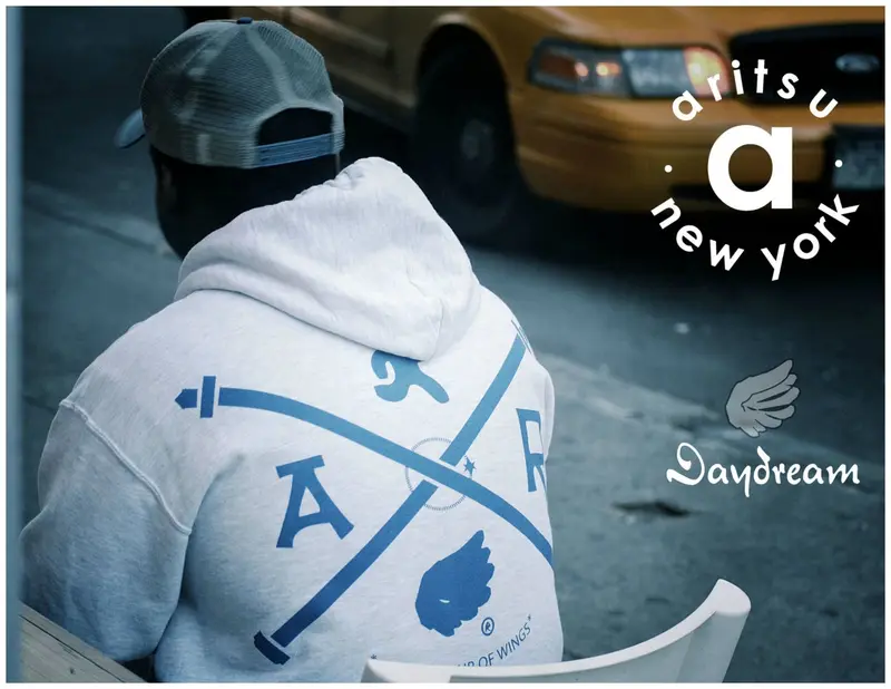 Hoodie back, taxi behind