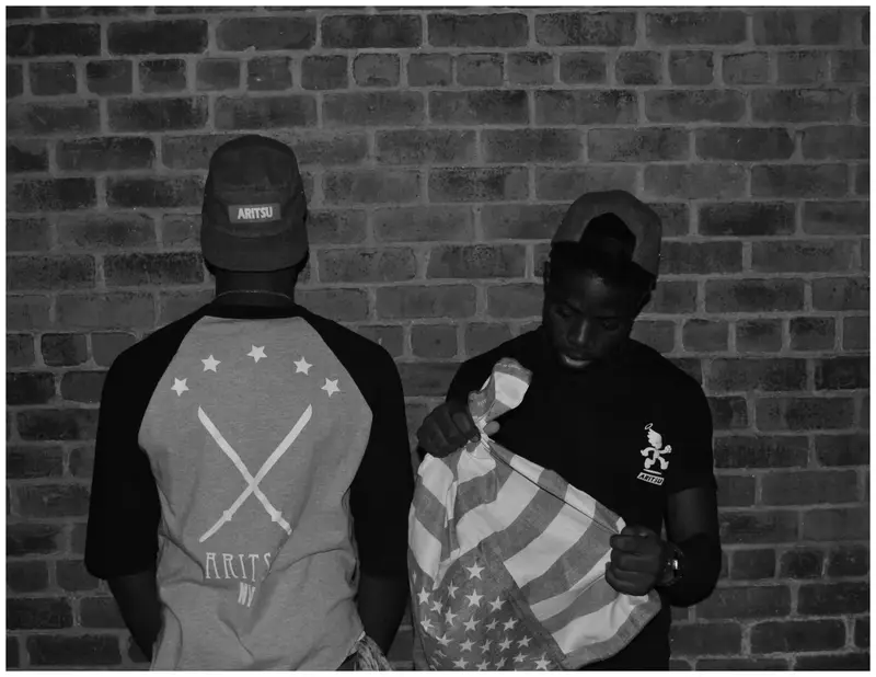 Black and white pair with flag