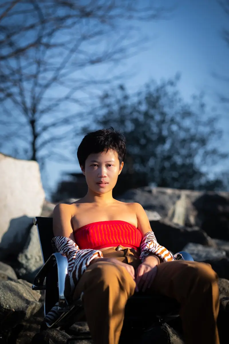 Woman on rocks, styled