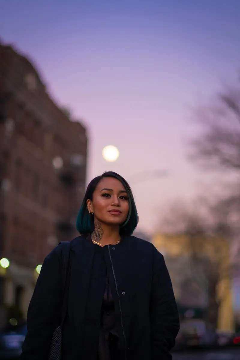 Woman on street at dusk