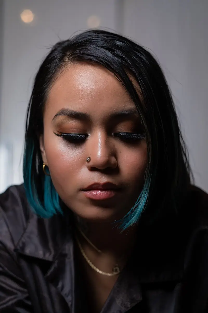 Close portrait, teal hair