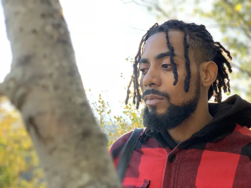 Man in plaid, autumn light