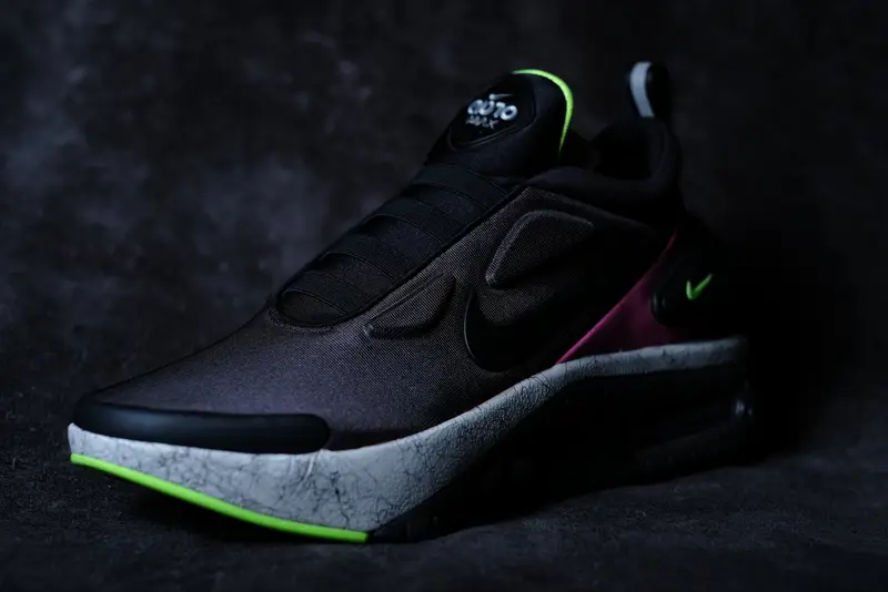 Nike Adapt Auto Max under hard key light on a dark backdrop