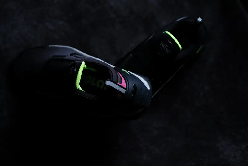 Nike Adapt Auto Max under hard key light on a dark backdrop