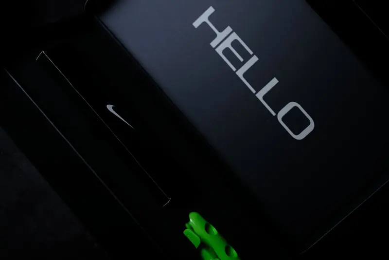 Nike Adapt Auto Max under hard key light on a dark backdrop
